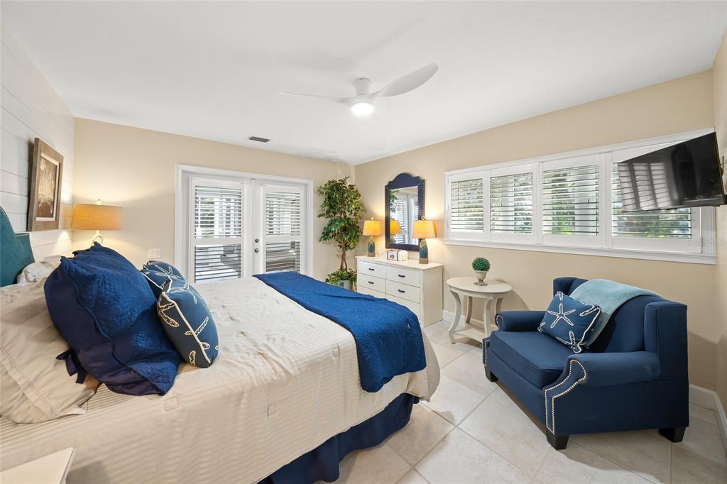 746 Eagle Point Drive Venice, FL 34285 - Photo 25 of 50 a bed room with a bed and a couch