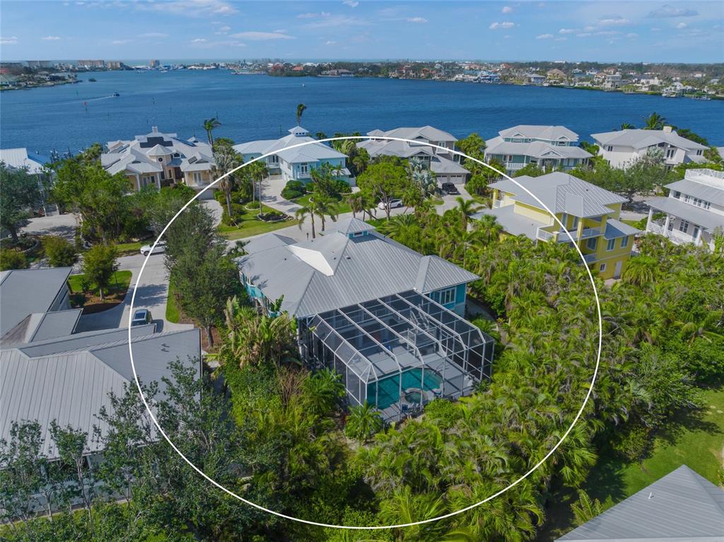 746 Eagle Point Drive Venice, FL 34285 - Photo 3 of 50 an aerial view of a house with a lake view