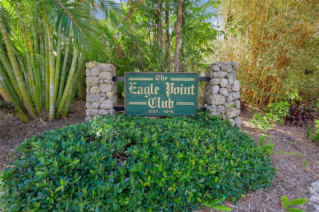 746 Eagle Point Drive Venice, FL 34285 - Photo 41 of 50 a sign board with tall trees