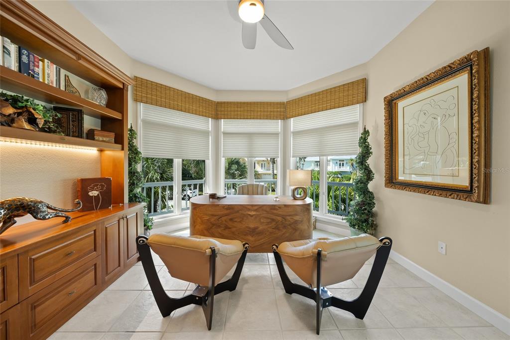 746 Eagle Point Drive Venice, FL 34285 - Photo 7 of 50 a living room with furniture and a window