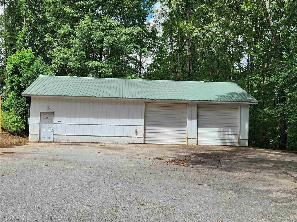 1397 McPherson Church Road Dallas, GA 30132 - Photo 6 of 9 front view of a house