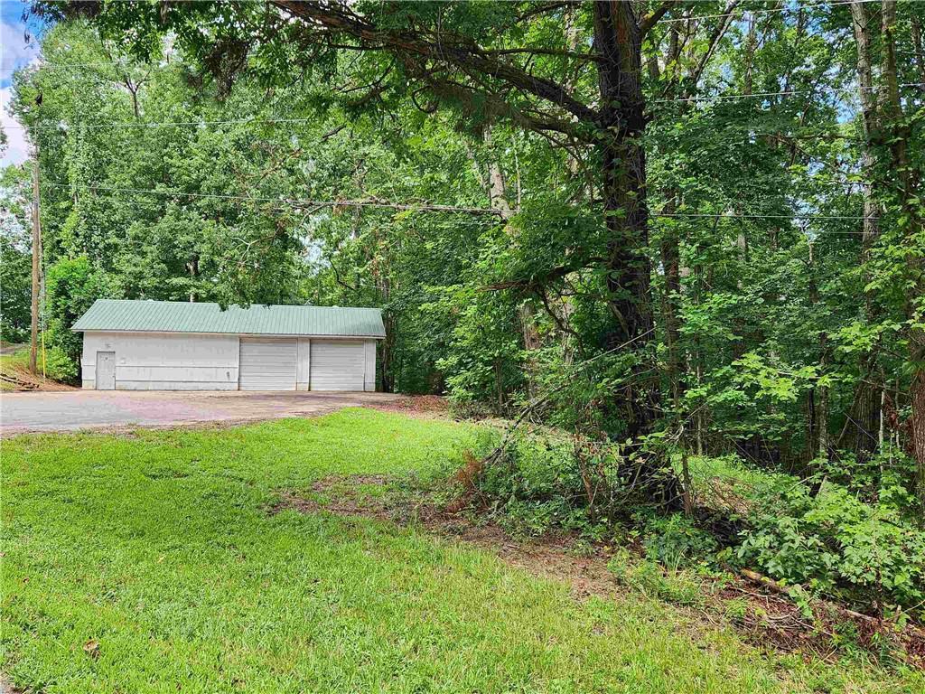 1397 McPherson Church Road Dallas, GA 30132 - Photo 8 of 9 a view of a backyard