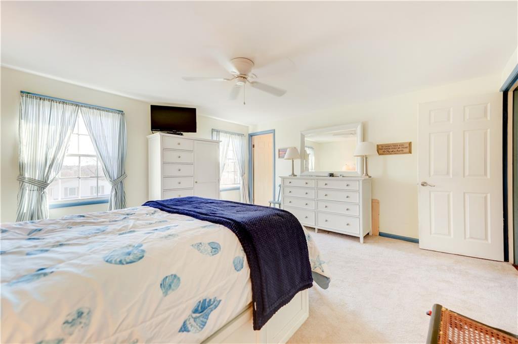 146 Morrison Drive Pittsburgh, PA 15216 - Photo 14 of 25 a bedroom with a large bed and a window