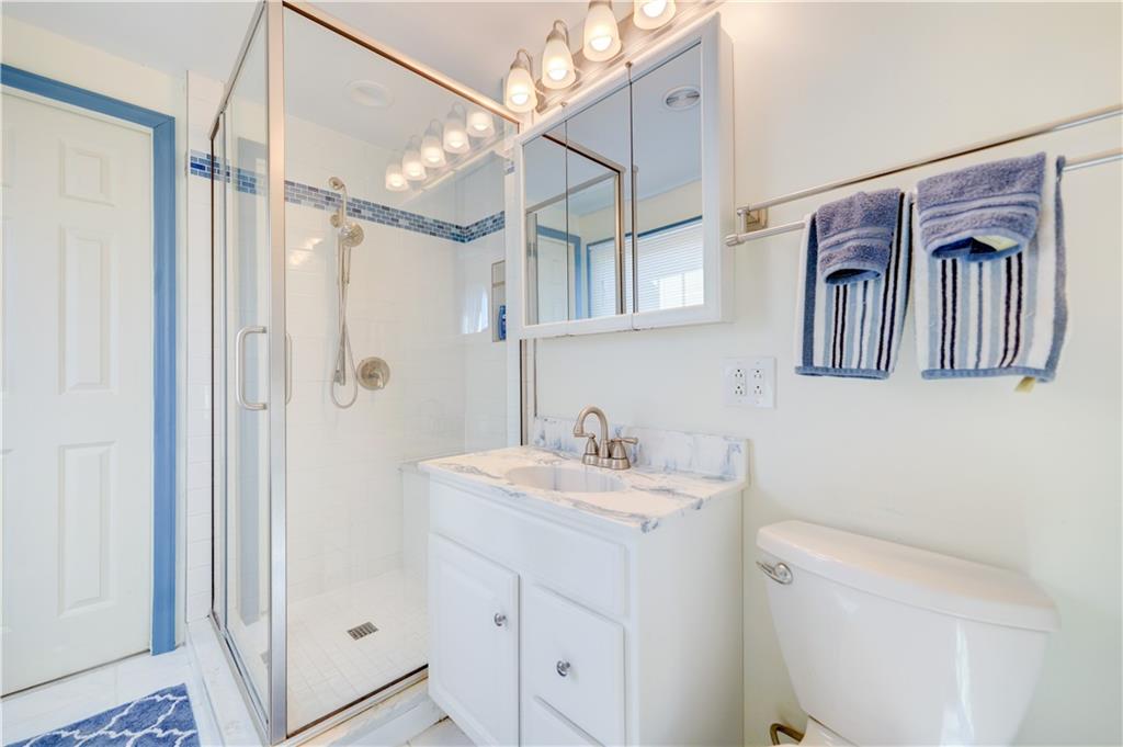 146 Morrison Drive Pittsburgh, PA 15216 - Photo 16 of 25 a bathroom with a sink a toilet and shower