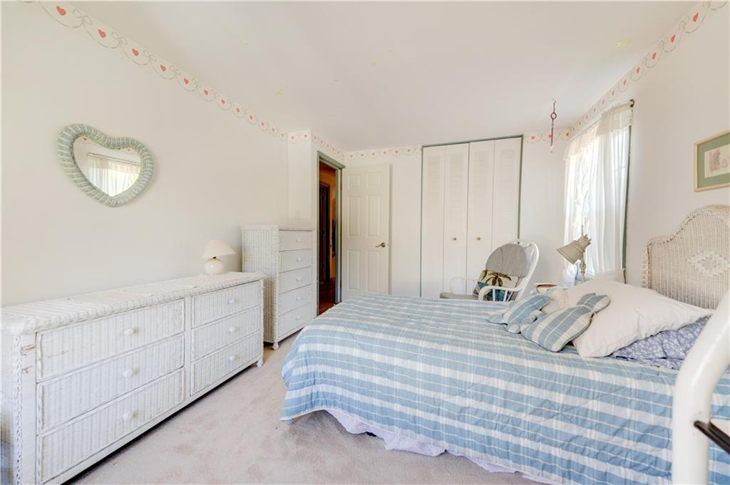 146 Morrison Drive Pittsburgh, PA 15216 - Photo 17 of 25 a bedroom with a bed and a dresser