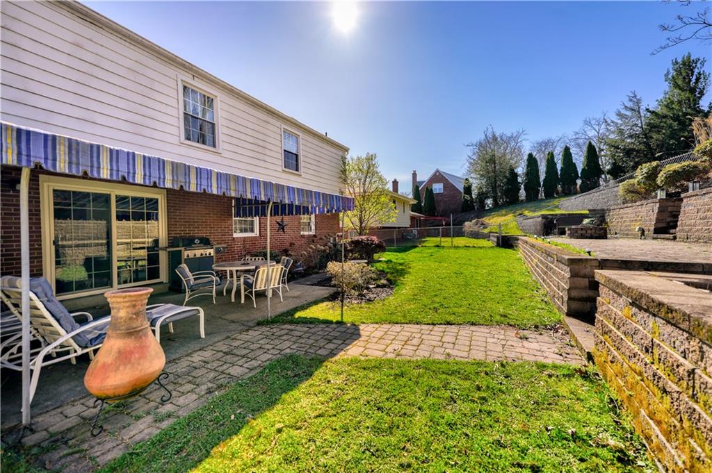 146 Morrison Drive Pittsburgh, PA 15216 - Photo 23 of 25 a view of a swimming pool and lounge chairs