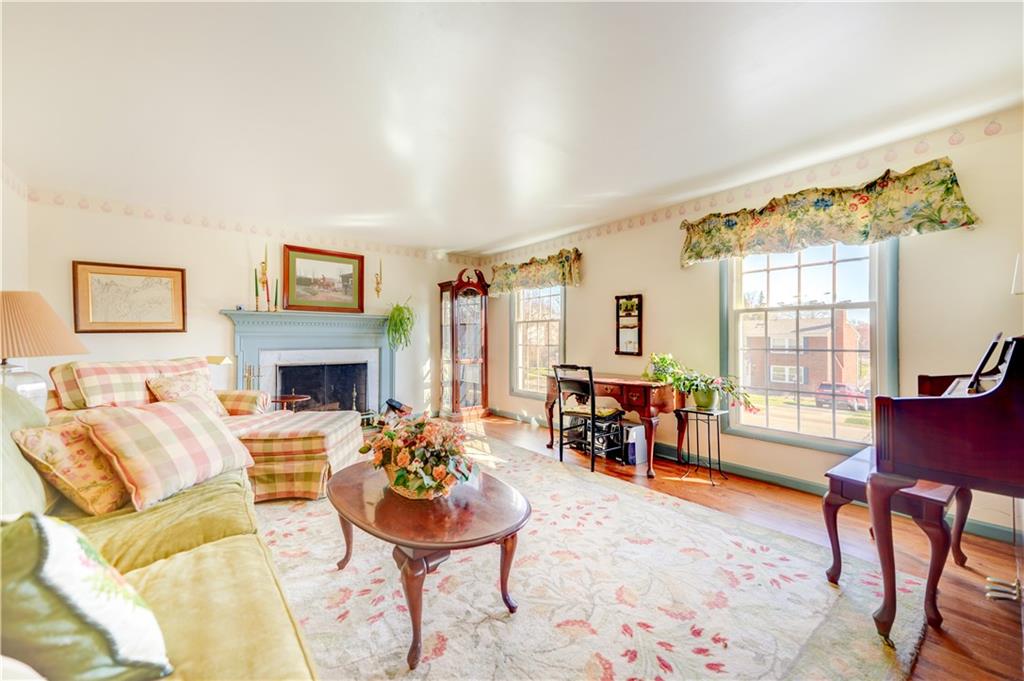 146 Morrison Drive Pittsburgh, PA 15216 - Photo 5 of 25 a living room with furniture and a fireplace