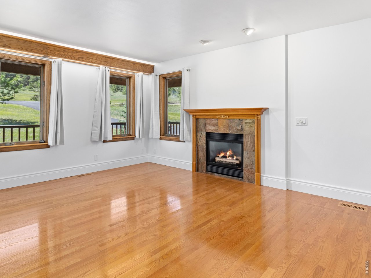 2180 Devils Gulch Road Estes Park, CO 80517 - Photo 14 of 40 Gleaming hardwood floors