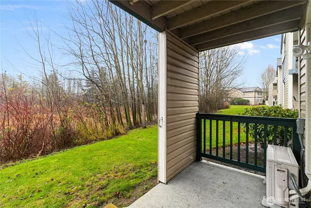 a view of a porch with a backyard