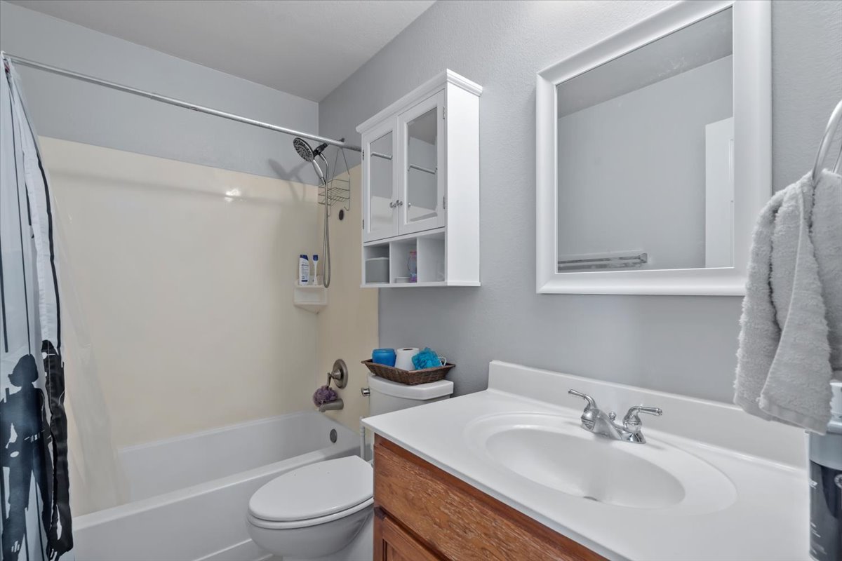 2338 Brookhollow Terrace Georgetown, TX 78626 - Photo 19 of 37 a bathroom with a sink toilet and shower