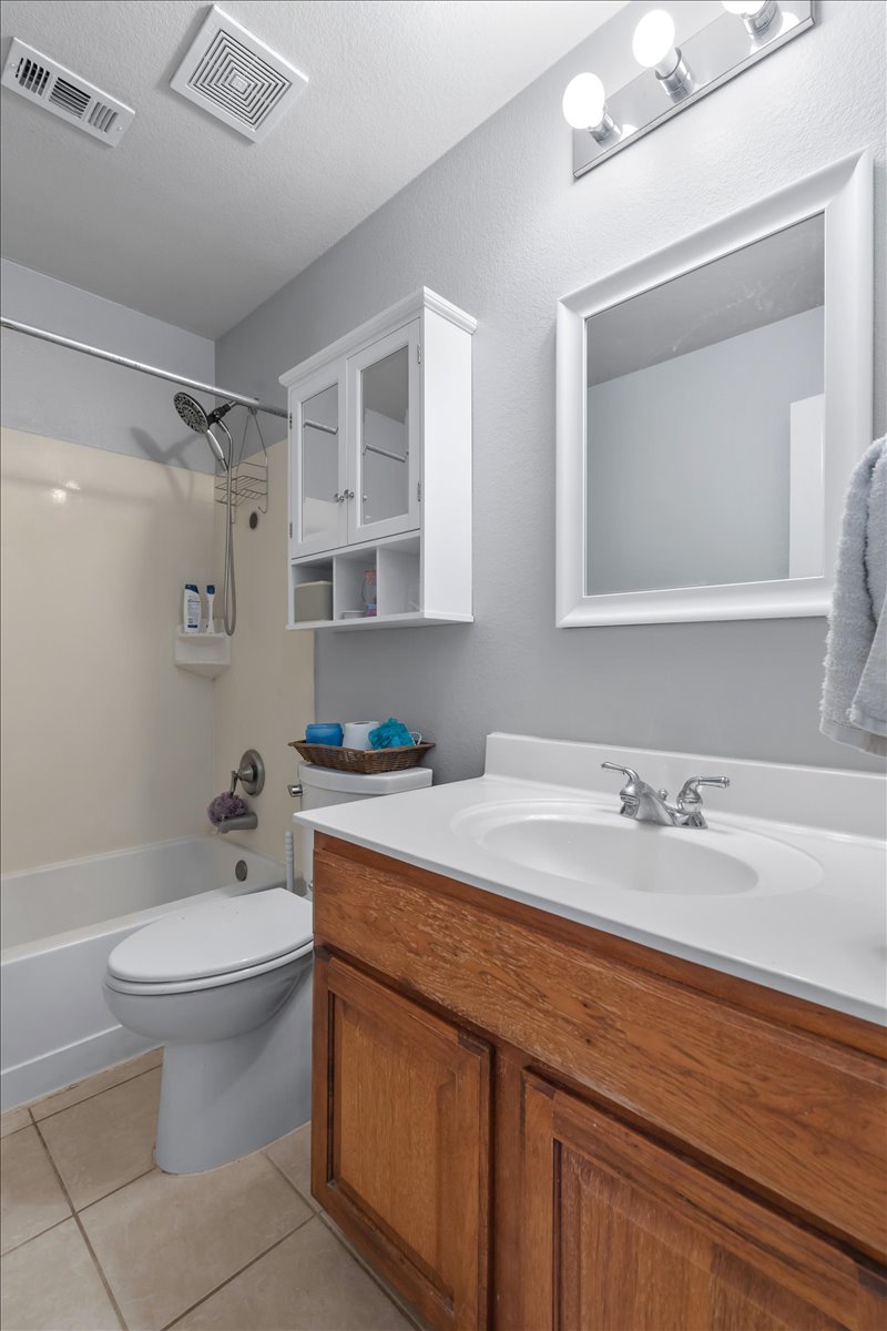 2338 Brookhollow Terrace Georgetown, TX 78626 - Photo 20 of 37 a bathroom with a sink toilet and shower