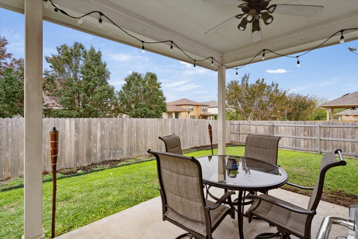 2338 Brookhollow Terrace Georgetown, TX 78626 - Photo 23 of 37 a view of a chairs and table in the patio