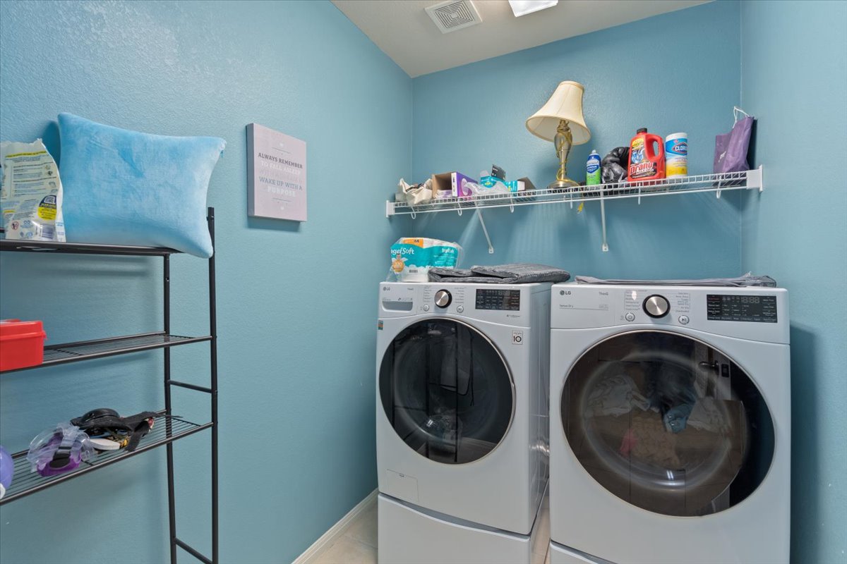 2338 Brookhollow Terrace Georgetown, TX 78626 - Photo 24 of 37 a utility room with dryer and washer