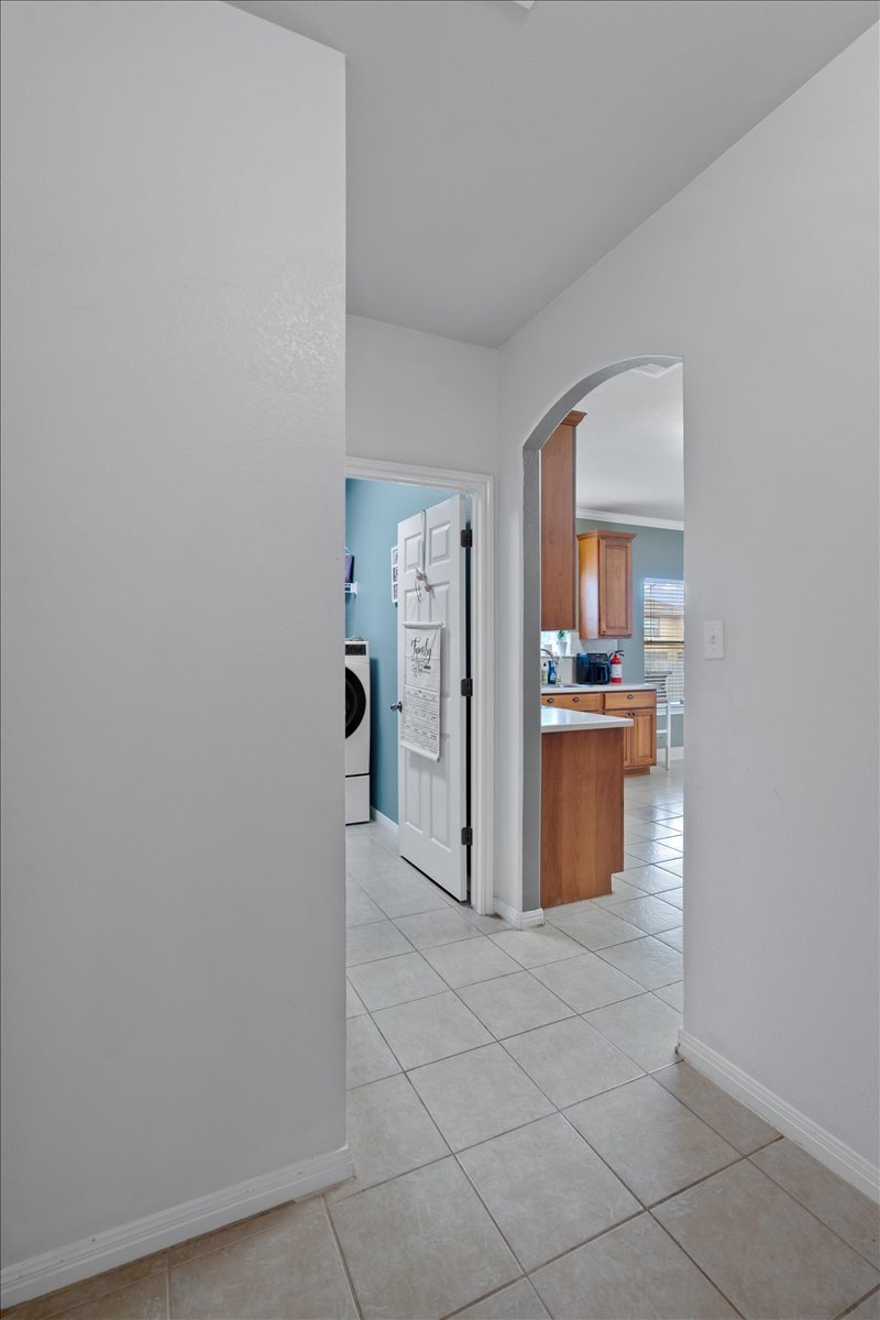 2338 Brookhollow Terrace Georgetown, TX 78626 - Photo 33 of 37 a view of a kitchen with refrigerator and mirror