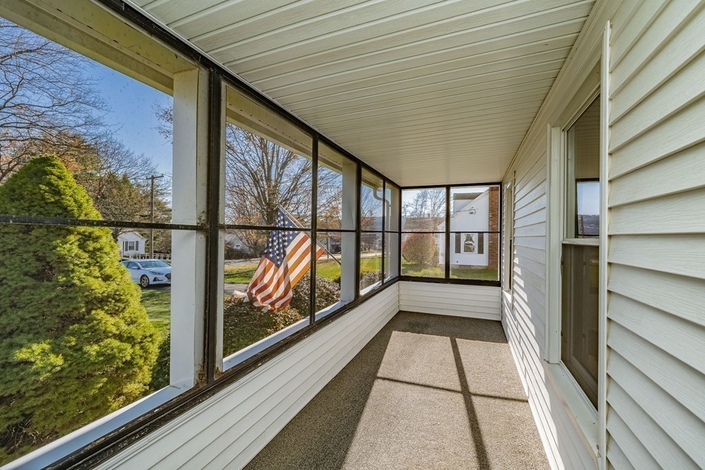 82 Belchertown Street Three Rivers, MA 01080 - Photo 4 of 25 a view of a balcony with wooden floor