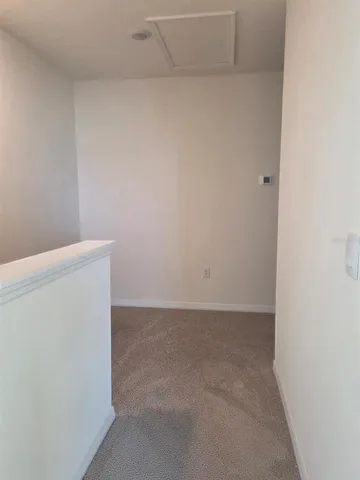 a kitchen with stainless steel appliances granite countertop a stove a sink a microwave and a refrigerator