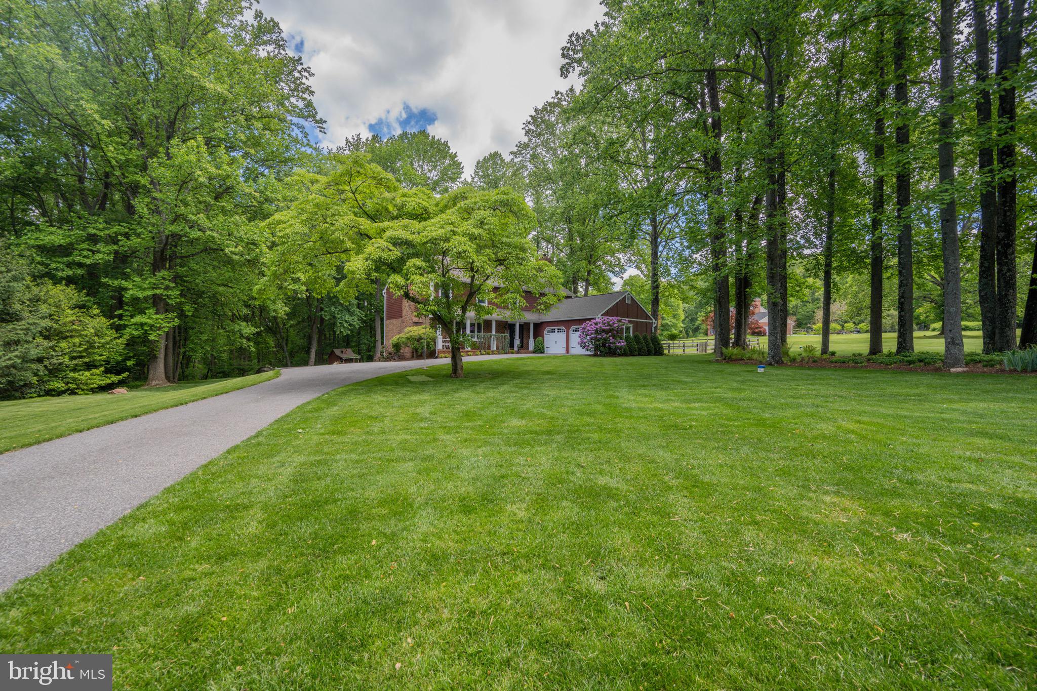 2 Wetherbee Court Phoenix, MD 21131 - Photo 5 of 19 a view of a green field with trees in the background