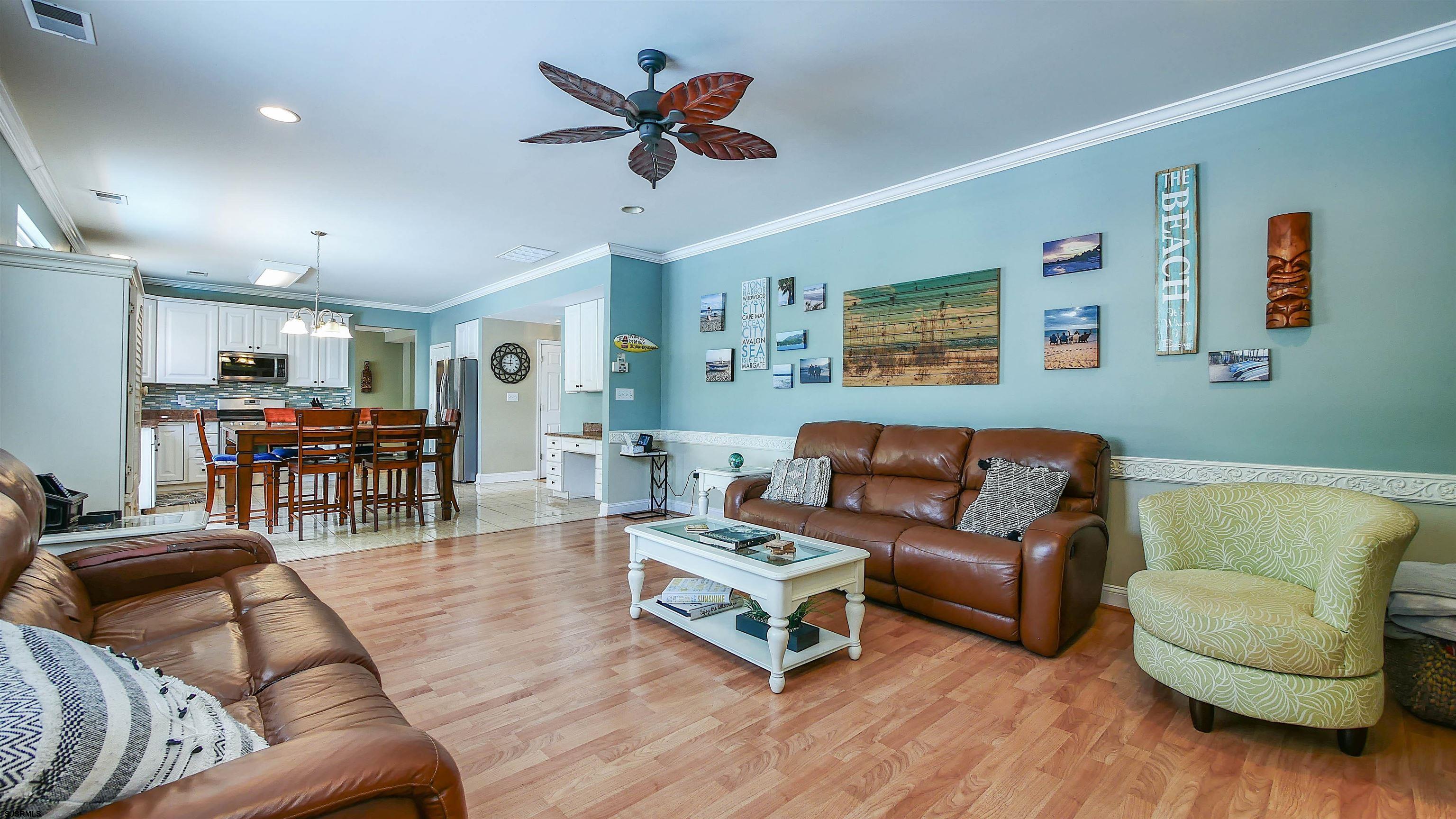 101 Haviv Drive Northfield, NJ 08225 - Photo 13 of 38 a living room with furniture and wooden floor