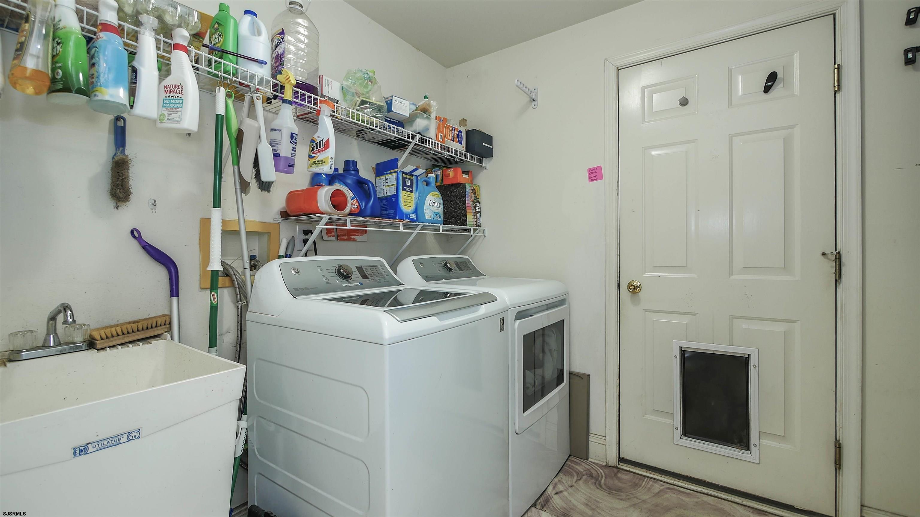 101 Haviv Drive Northfield, NJ 08225 - Photo 17 of 38 a utility room with dryer and washer