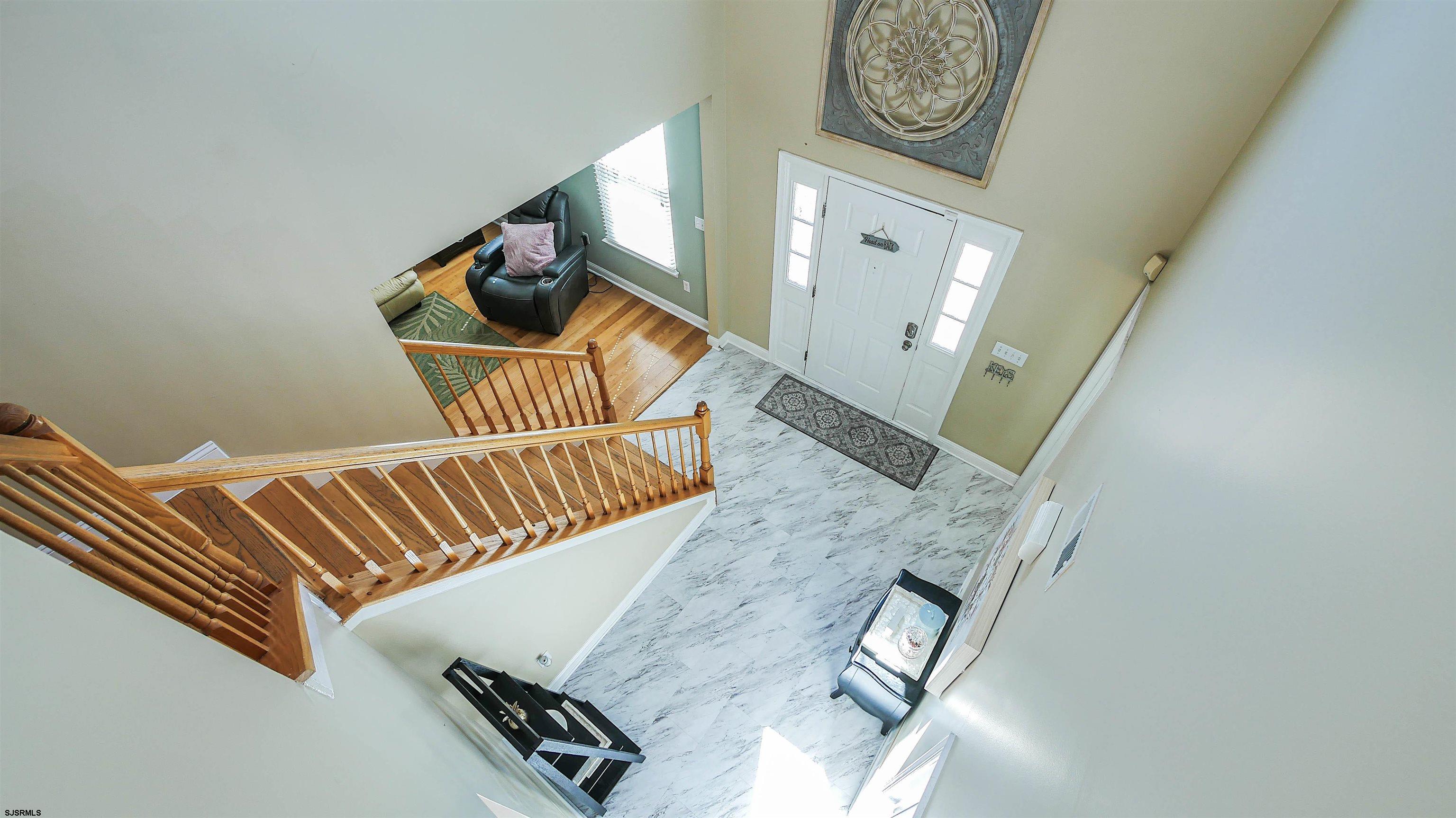 101 Haviv Drive Northfield, NJ 08225 - Photo 18 of 38 a view of stairs with furniture