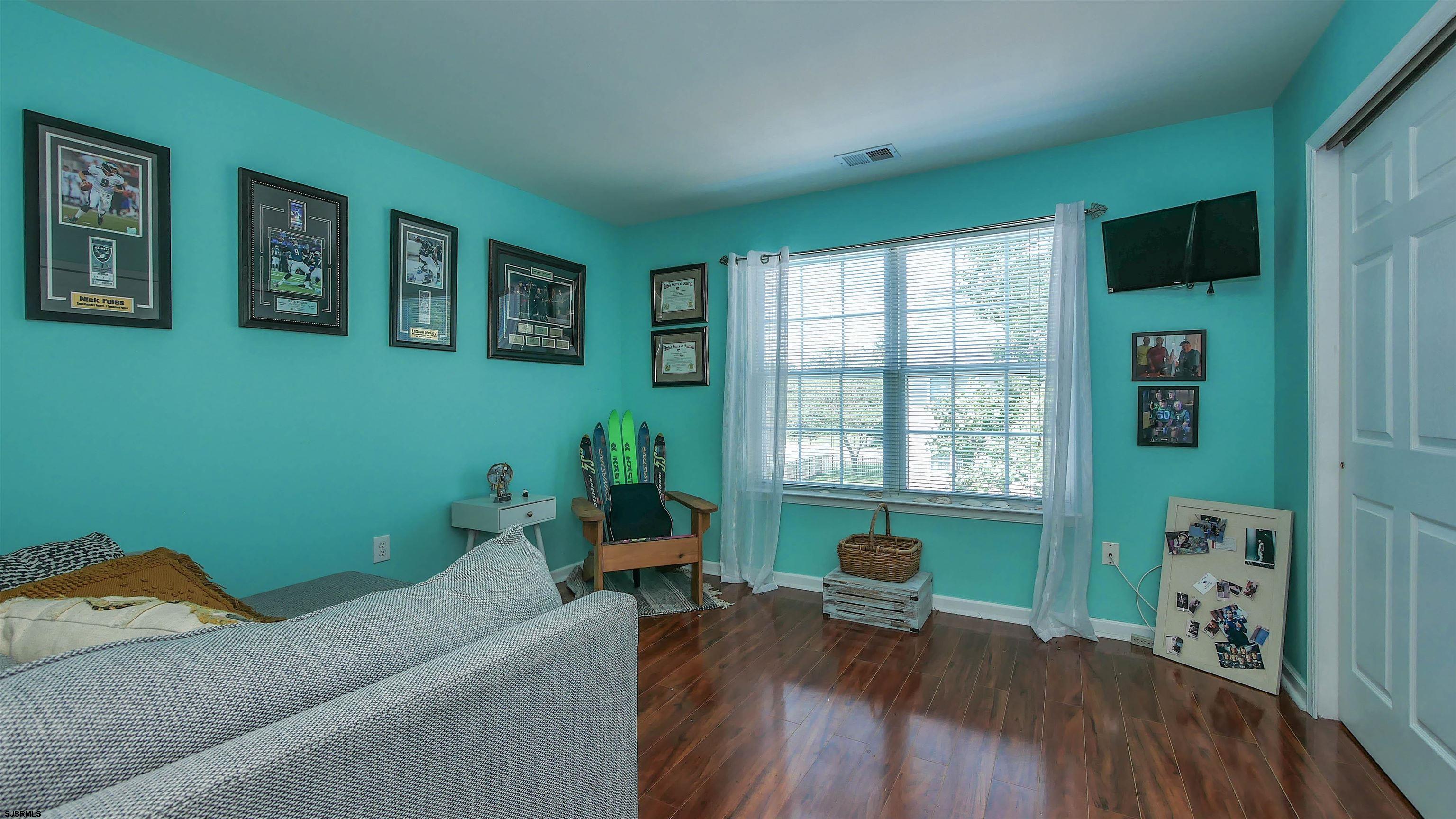 101 Haviv Drive Northfield, NJ 08225 - Photo 26 of 38 a living room with furniture and a window