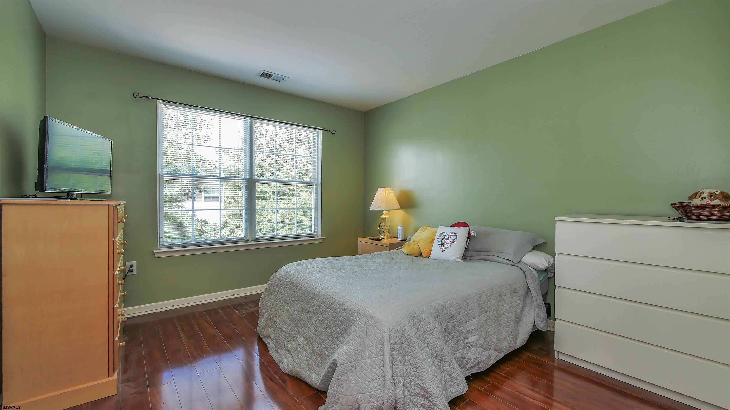 101 Haviv Drive Northfield, NJ 08225 - Photo 28 of 38 a bedroom with a bed and a window