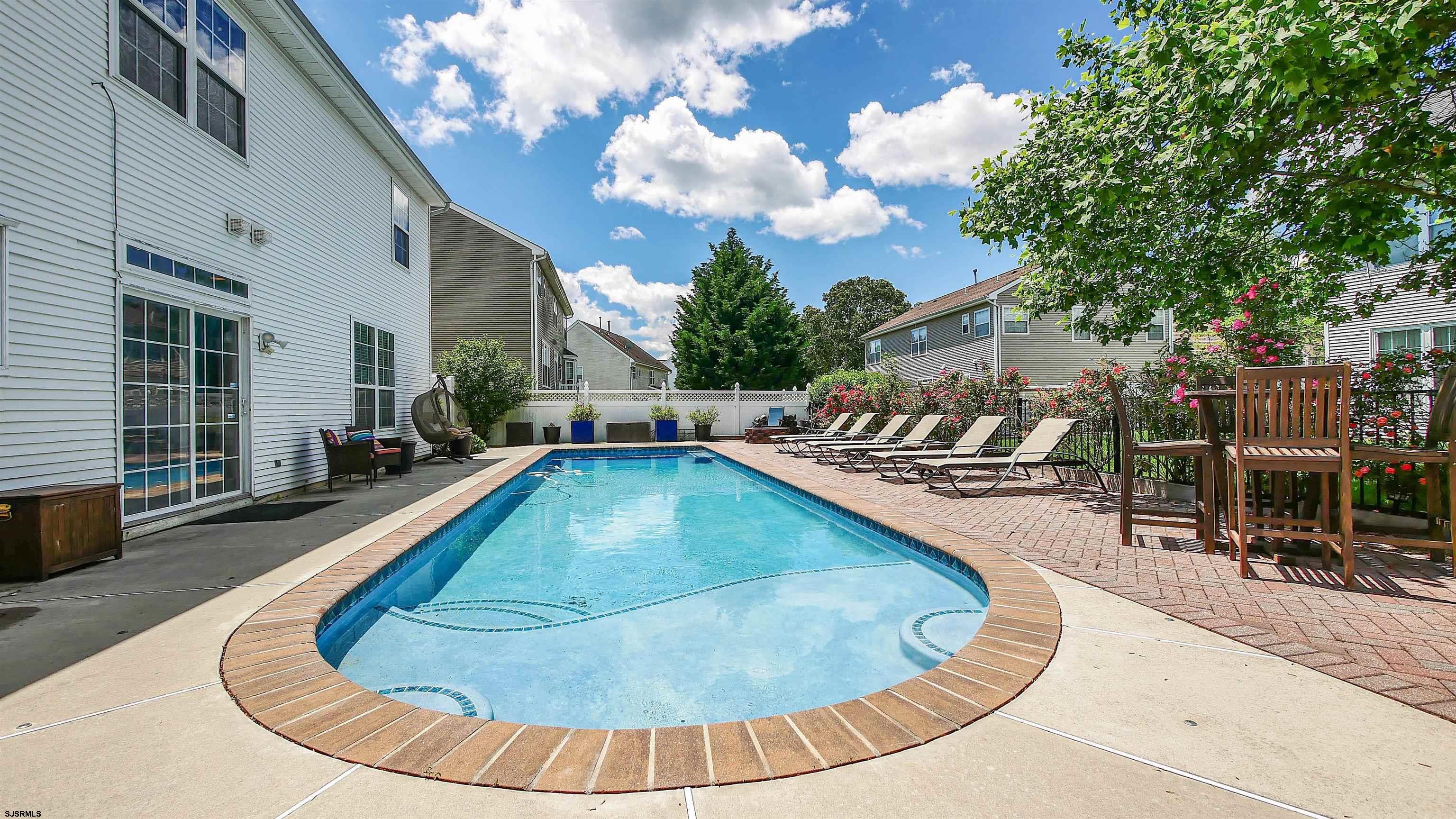 101 Haviv Drive Northfield, NJ 08225 - Photo 30 of 38 swimming pool view with sitting space