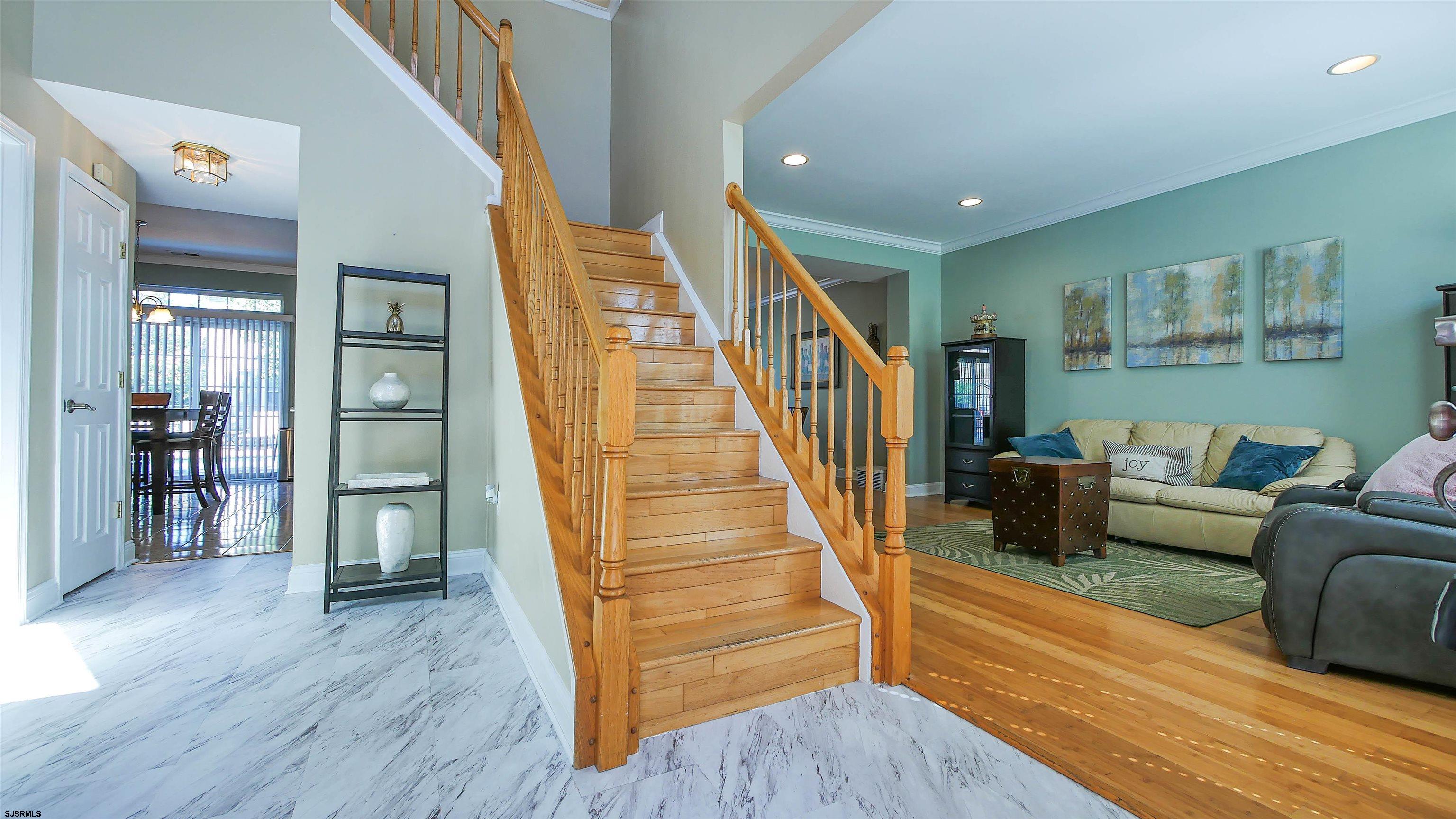 101 Haviv Drive Northfield, NJ 08225 - Photo 3 of 38 a living room with furniture and wooden floor