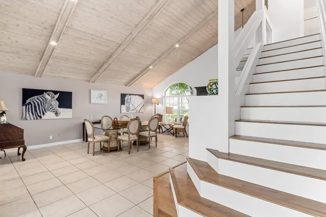 a view of living room with furniture and white walls