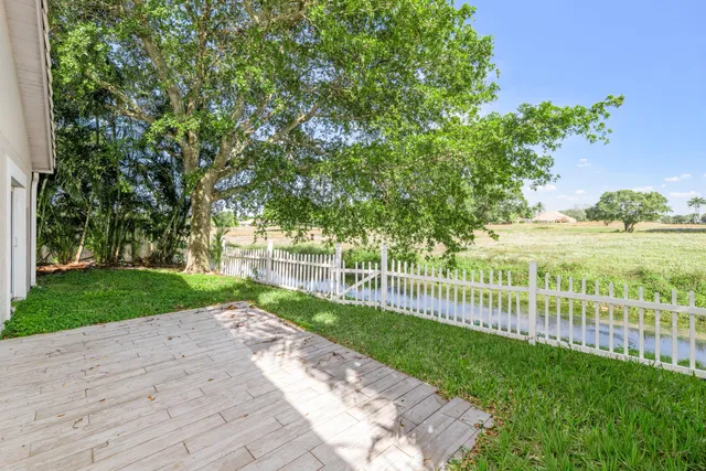 a view of a yard and a trees