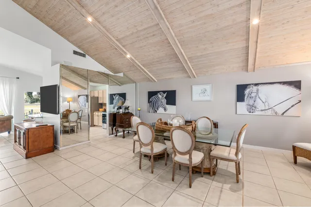 a view of a livingroom with furniture and lounge chair
