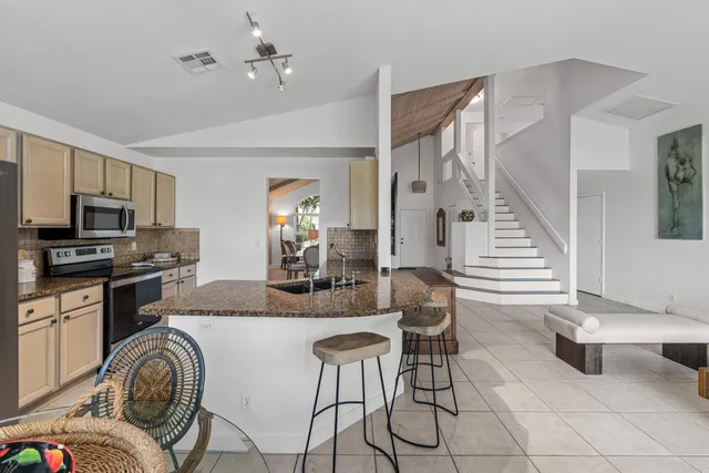 a view of a dining room with furniture
