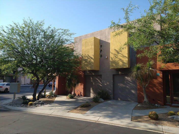 225 Sandy Point Trail Palm Springs, CA 92262 - Photo 14 of 38 a front view of a building with street view
