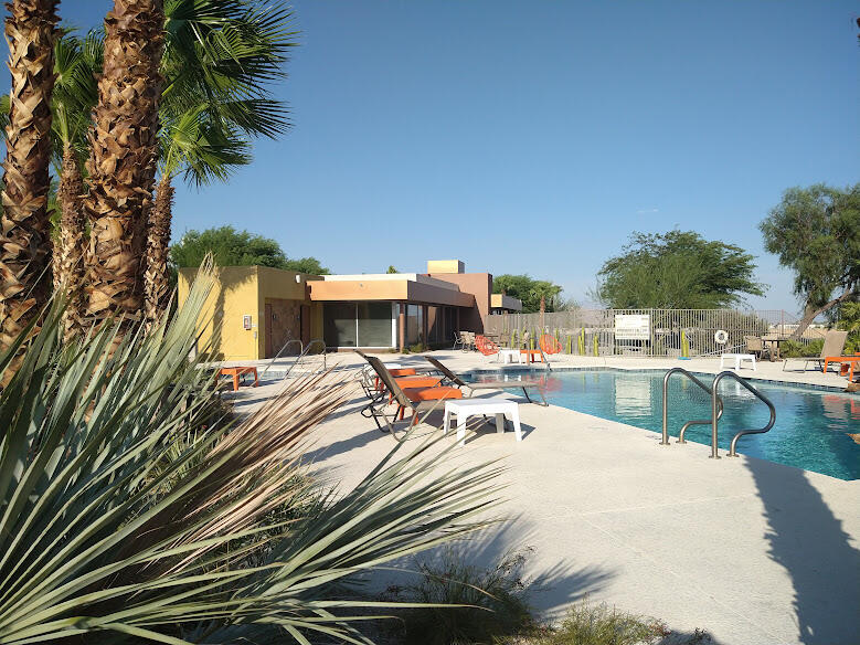225 Sandy Point Trail Palm Springs, CA 92262 - Photo 4 of 38 a view of a swimming pool with a patio