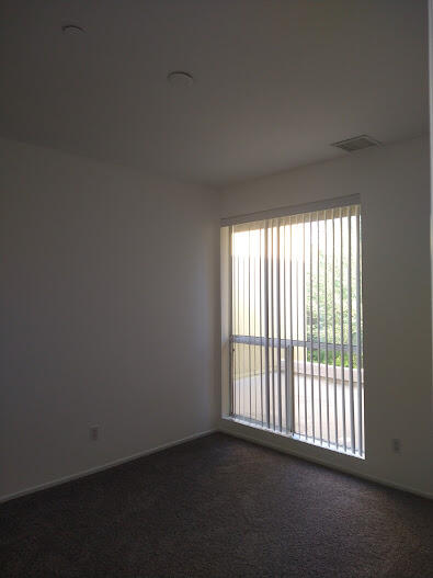 225 Sandy Point Trail Palm Springs, CA 92262 - Photo 33 of 38 a view of an empty room with a window