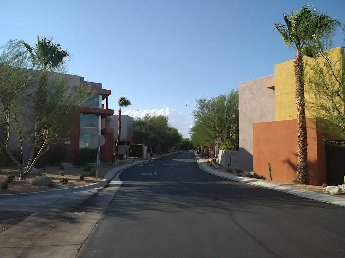 225 Sandy Point Trail Palm Springs, CA 92262 - Photo 6 of 38 a view of a street with a building in the background