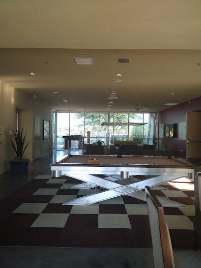 225 Sandy Point Trail Palm Springs, CA 92262 - Photo 9 of 38 a view of a lobby with black carpet