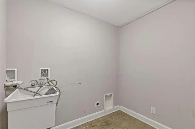 a bathroom with a sink and cabinets