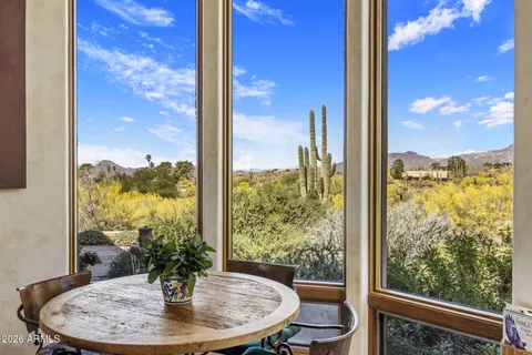 a view of a city from a dining room
