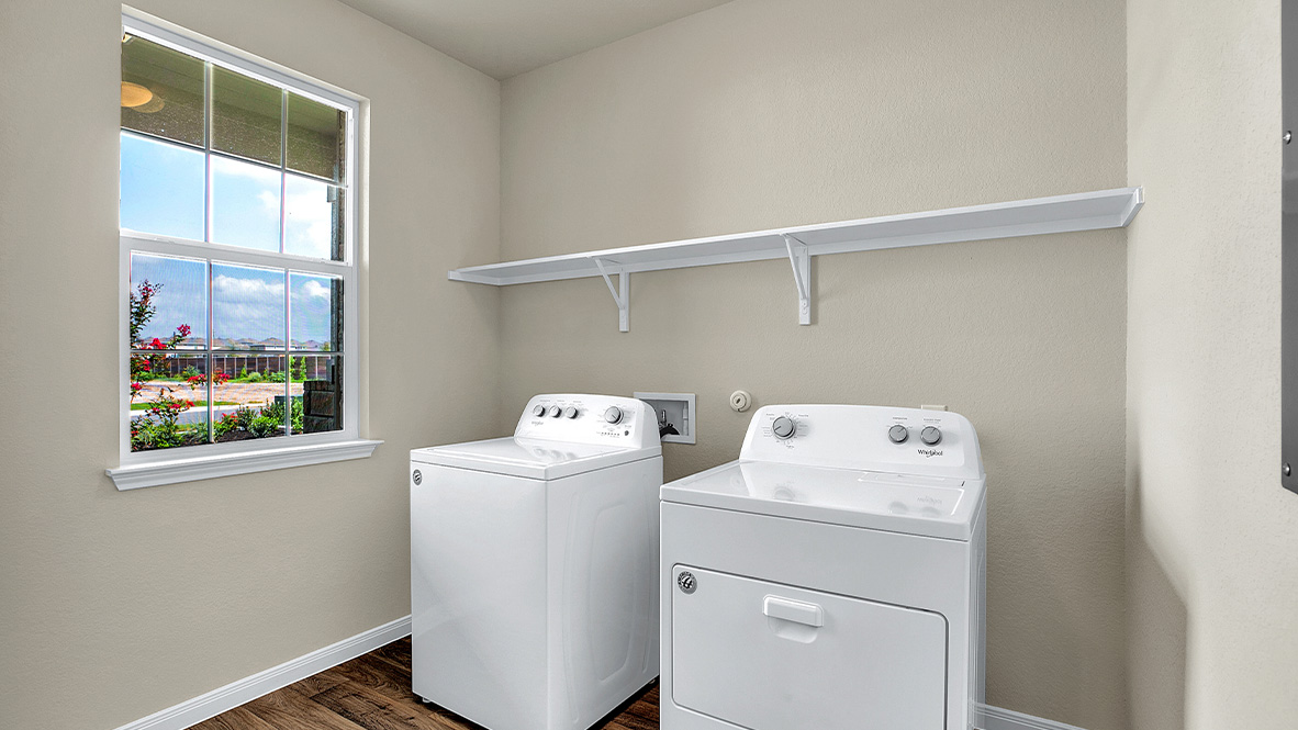 121 Little Walnut Cove Kyle, TX 78640 - Photo 29 of 31 a utility room with dryer and washer