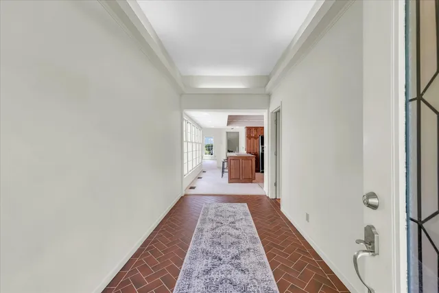 a hallway with a furniture