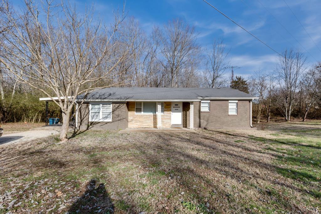 RANCH BRICK HOME WITH ONE CAR CARPORT