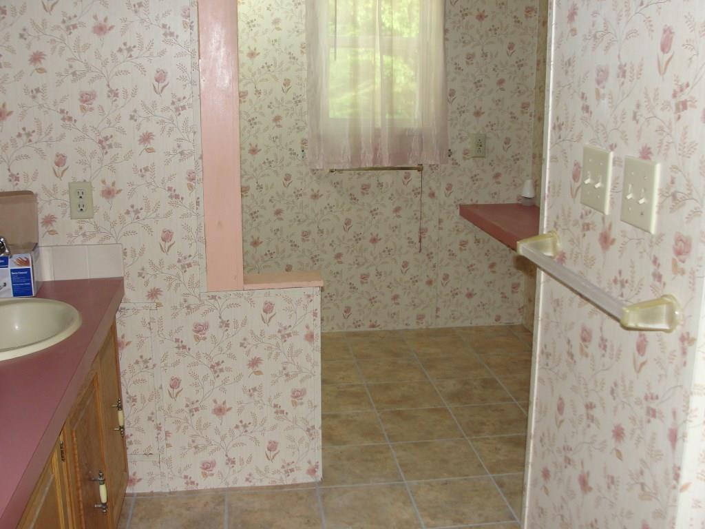 134 Town Farm Road Harrison, ME 04040 - Photo 31 of 33 Brand new tile floor in master bath.