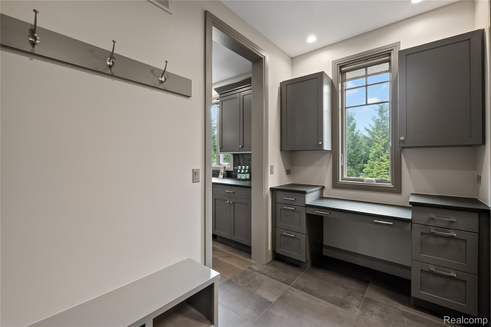 3824 Poppleton Street Troy, MI 48084 - Photo 15 of 51 Mudroom featuring built in desk, plenty of natural light, and recessed lighting