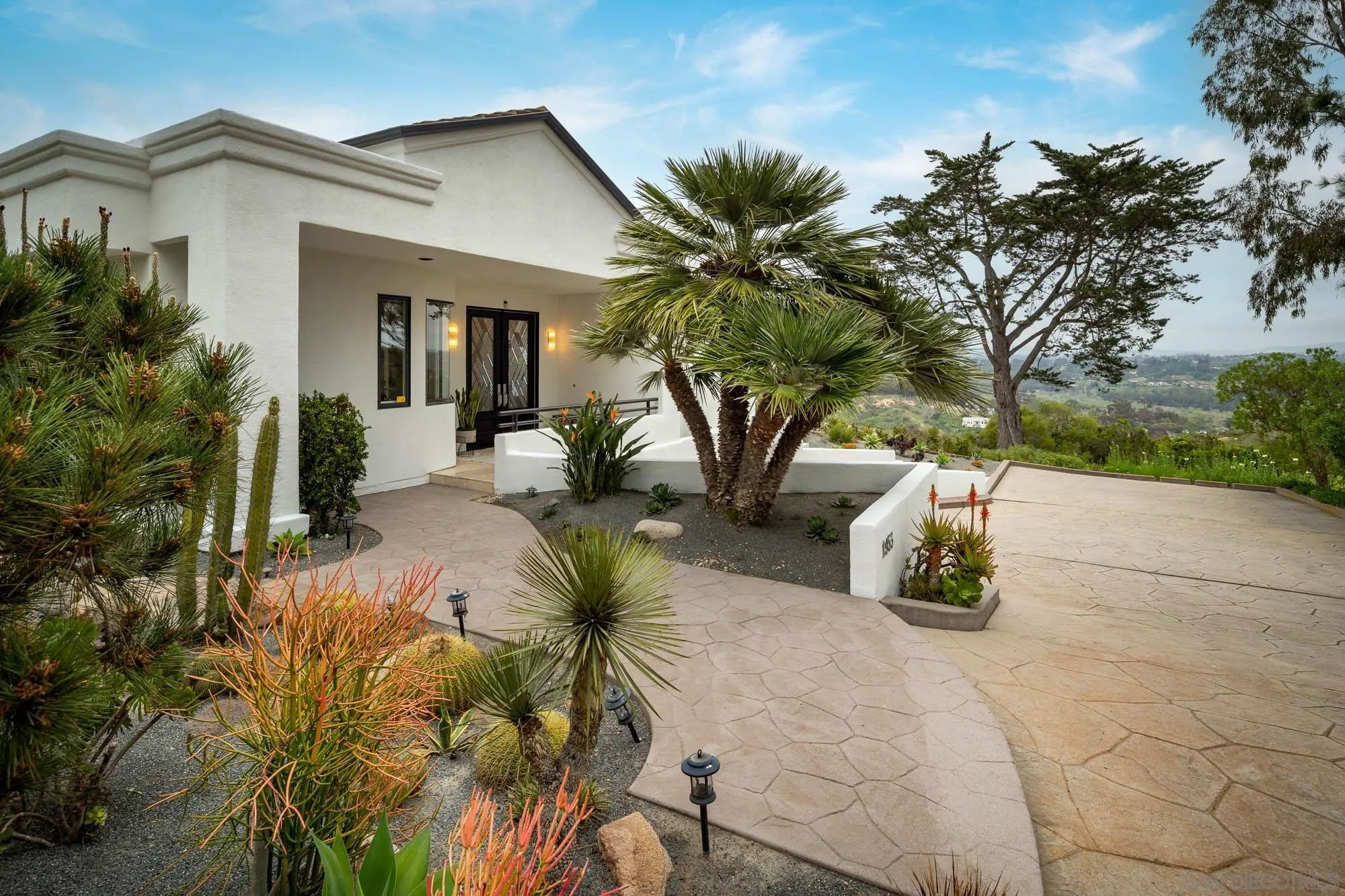 1953 Crest Drive Encinitas, CA 92024 - Photo 12 of 42 a view of a house with a patio
