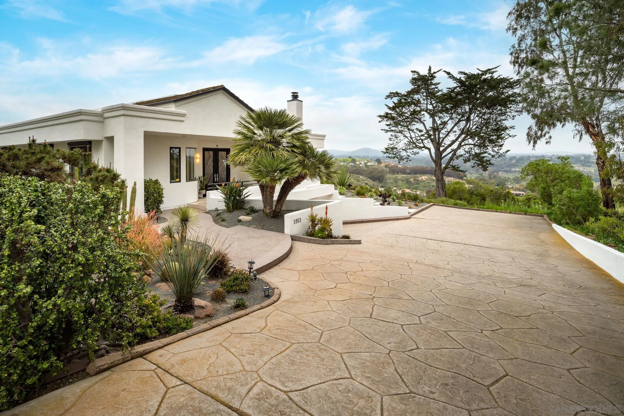 1953 Crest Drive Encinitas, CA 92024 - Photo 13 of 42 a view of the house with backyard and sitting area
