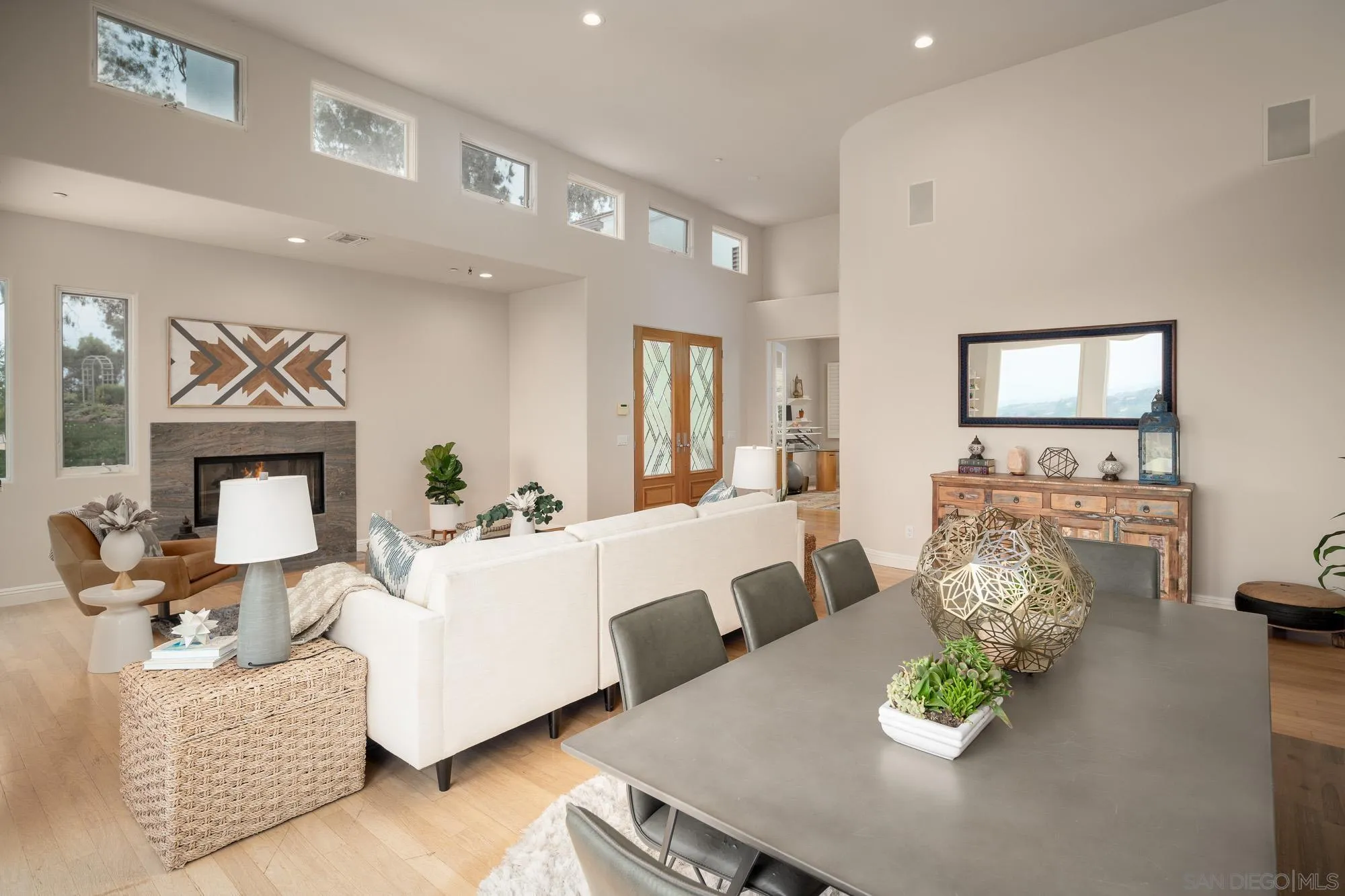 1953 Crest Drive Encinitas, CA 92024 - Photo 20 of 42 a living room with furniture and a flat screen tv
