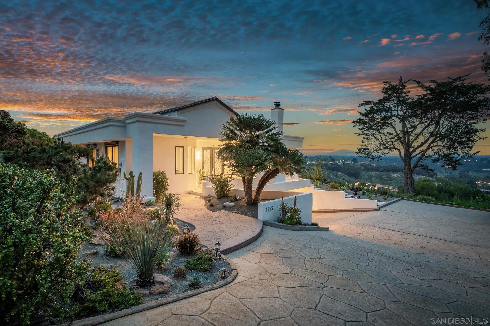 1953 Crest Drive Encinitas, CA 92024 - Photo 2 of 42 a view of a house with backyard and garden
