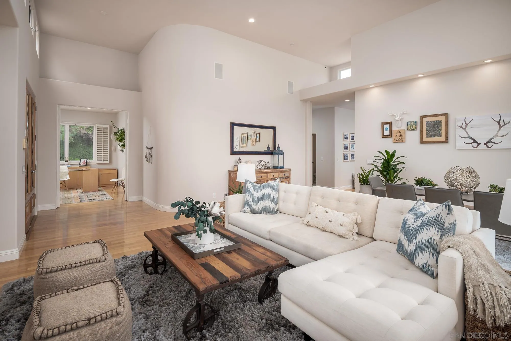 1953 Crest Drive Encinitas, CA 92024 - Photo 22 of 42 a living room with furniture and wooden floor