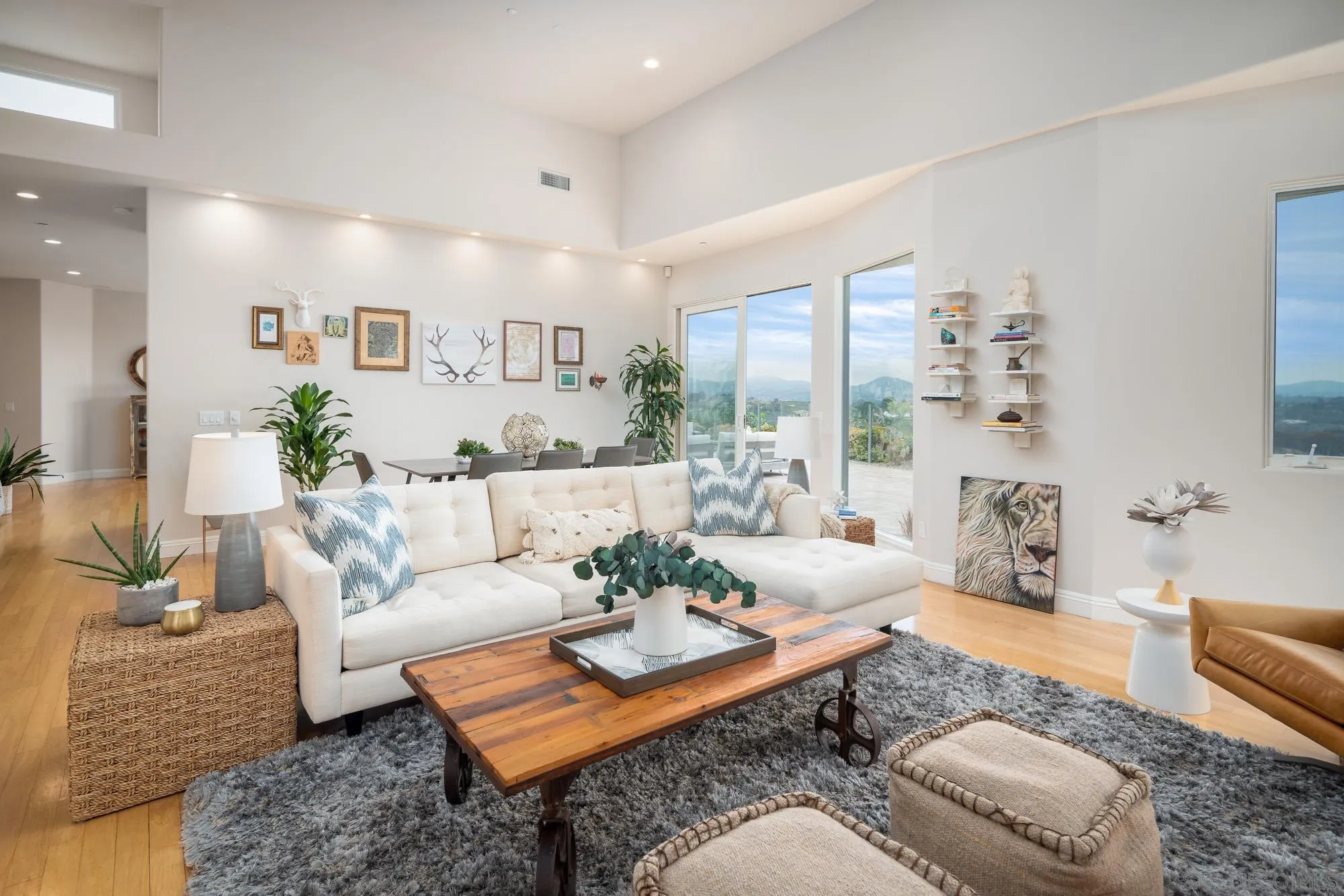 1953 Crest Drive Encinitas, CA 92024 - Photo 23 of 42 a living room with furniture and a table